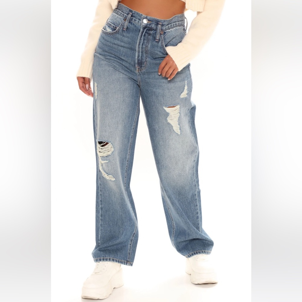 Non stretch slouchy, distressed blue jeans. Medium blue wash. Size 7